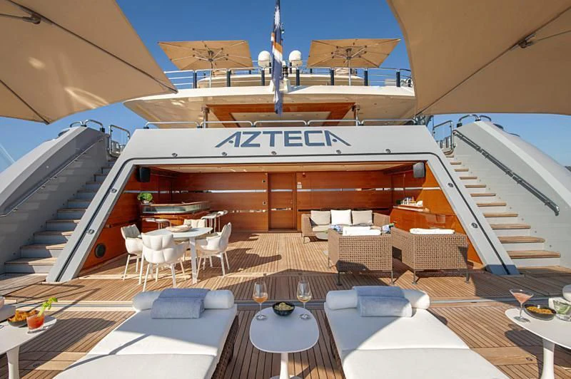 a large cruise ship docked aboard ARBEMA Yacht for Sale