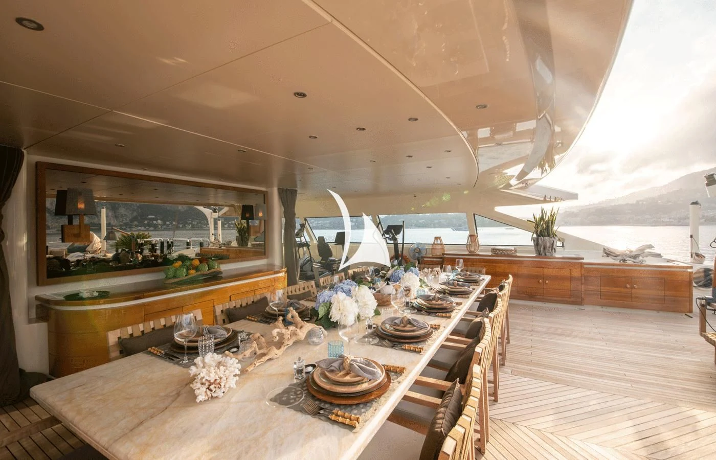 a large modern house with a large dining table and a large window aboard ARBEMA Yacht for Sale