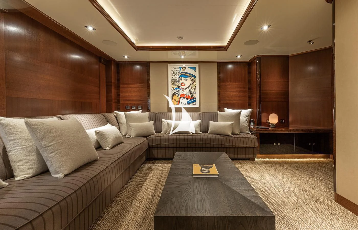 a living room with a couch and a coffee table aboard ARBEMA Yacht for Sale
