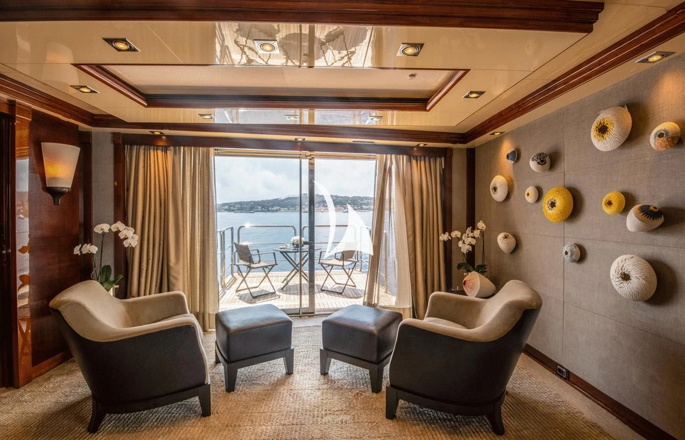a room with a table chairs and a window aboard ARBEMA Yacht for Sale