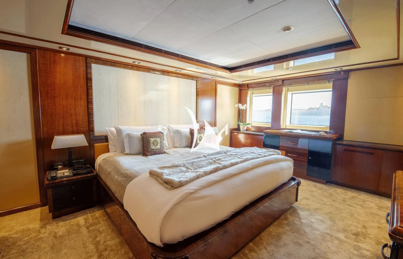 a bedroom with a large bed aboard ARBEMA Yacht for Sale