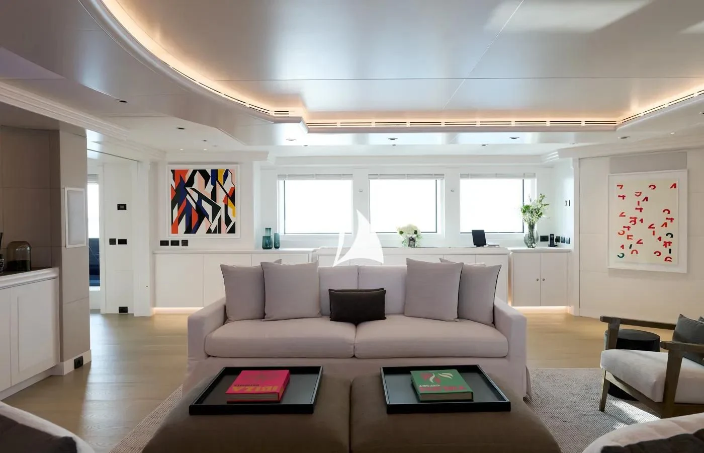 a living room with a white couch aboard ARBEMA Yacht for Sale