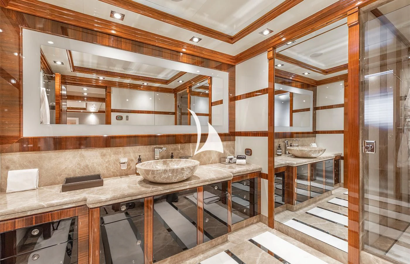 a kitchen with a sink and a large mirror aboard ARBEMA Yacht for Sale