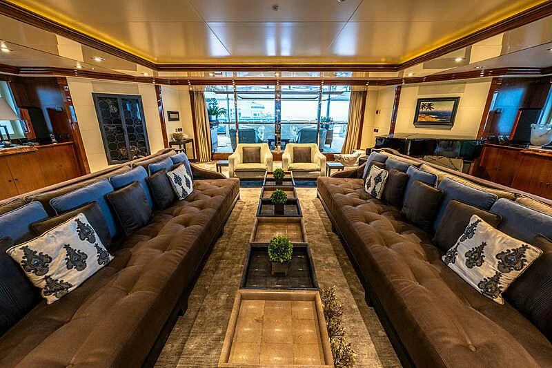 a living room with leather couches aboard ARBEMA Yacht for Sale