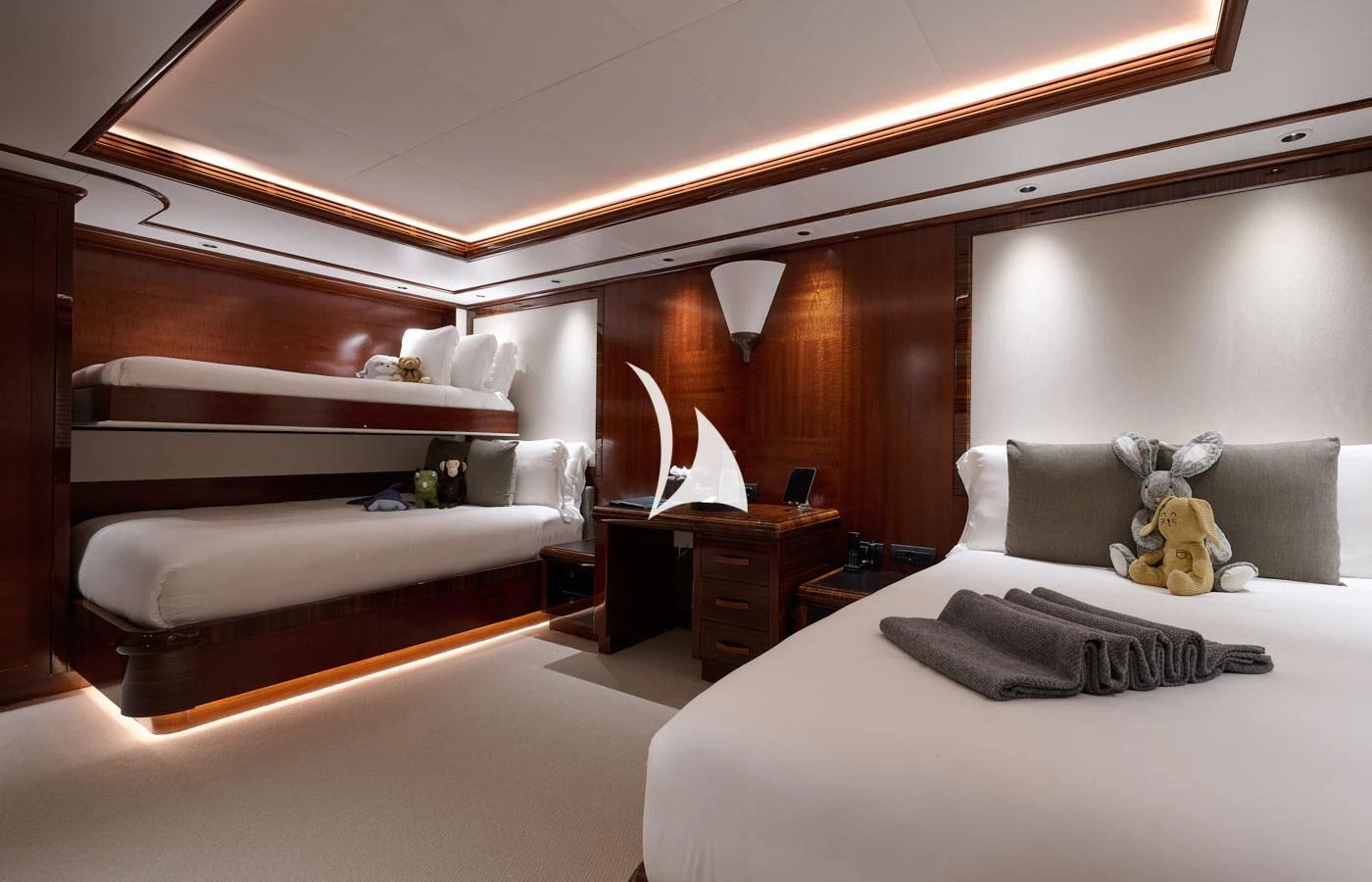 a bedroom with two beds aboard ARBEMA Yacht for Sale