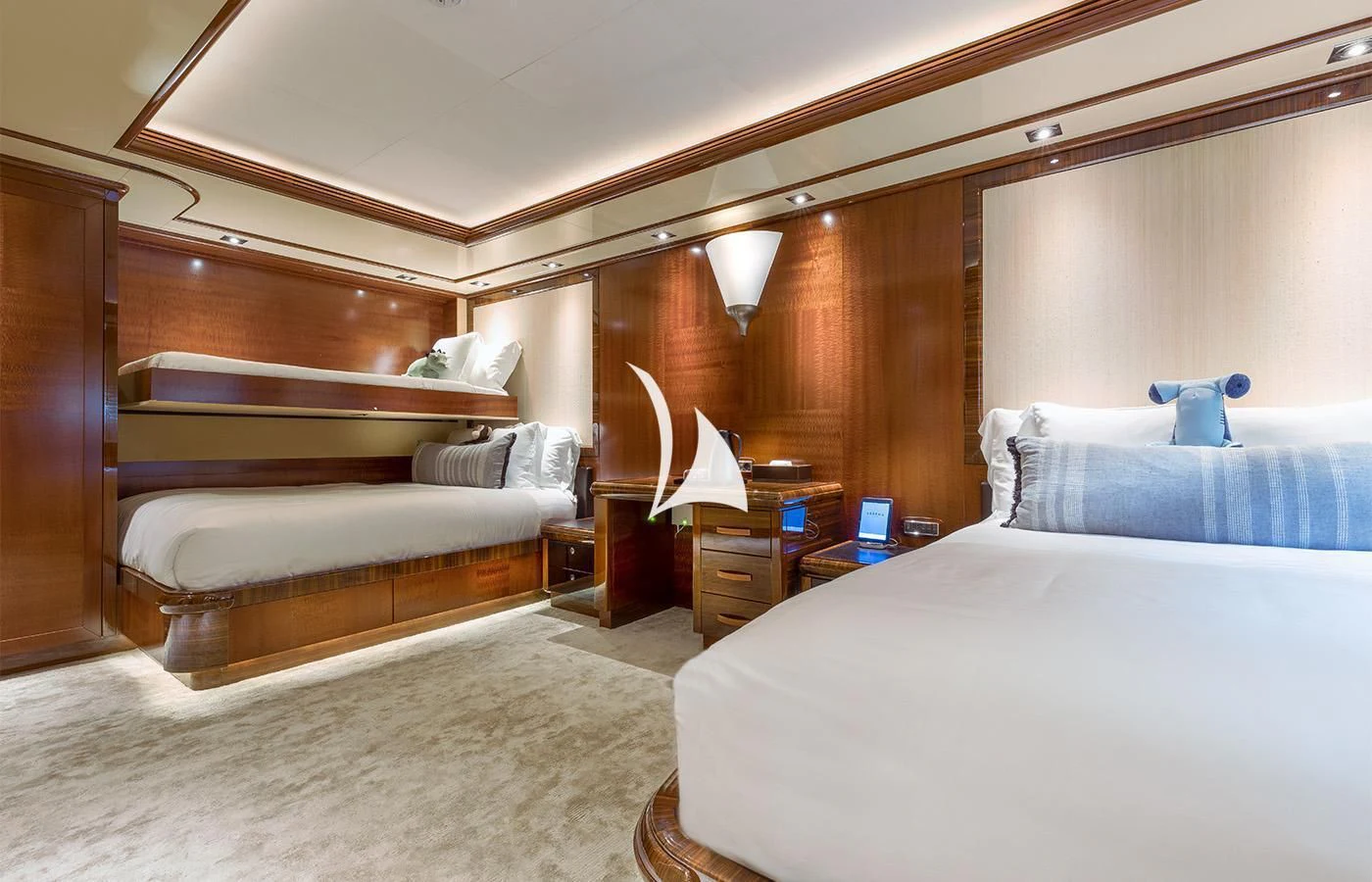 a bedroom with a bed and a desk aboard ARBEMA Yacht for Sale