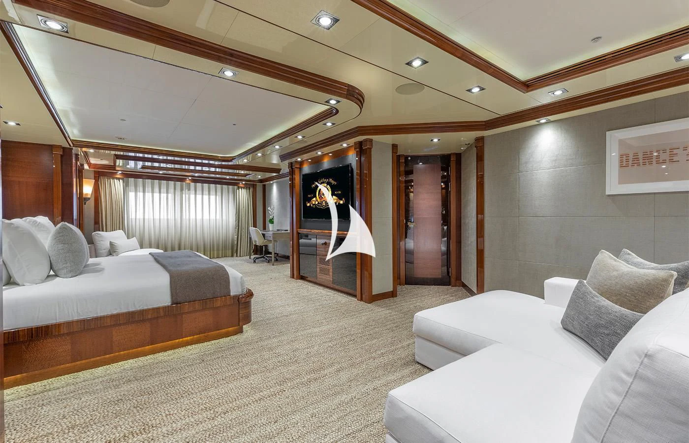 a room with a bed and a large window aboard ARBEMA Yacht for Sale