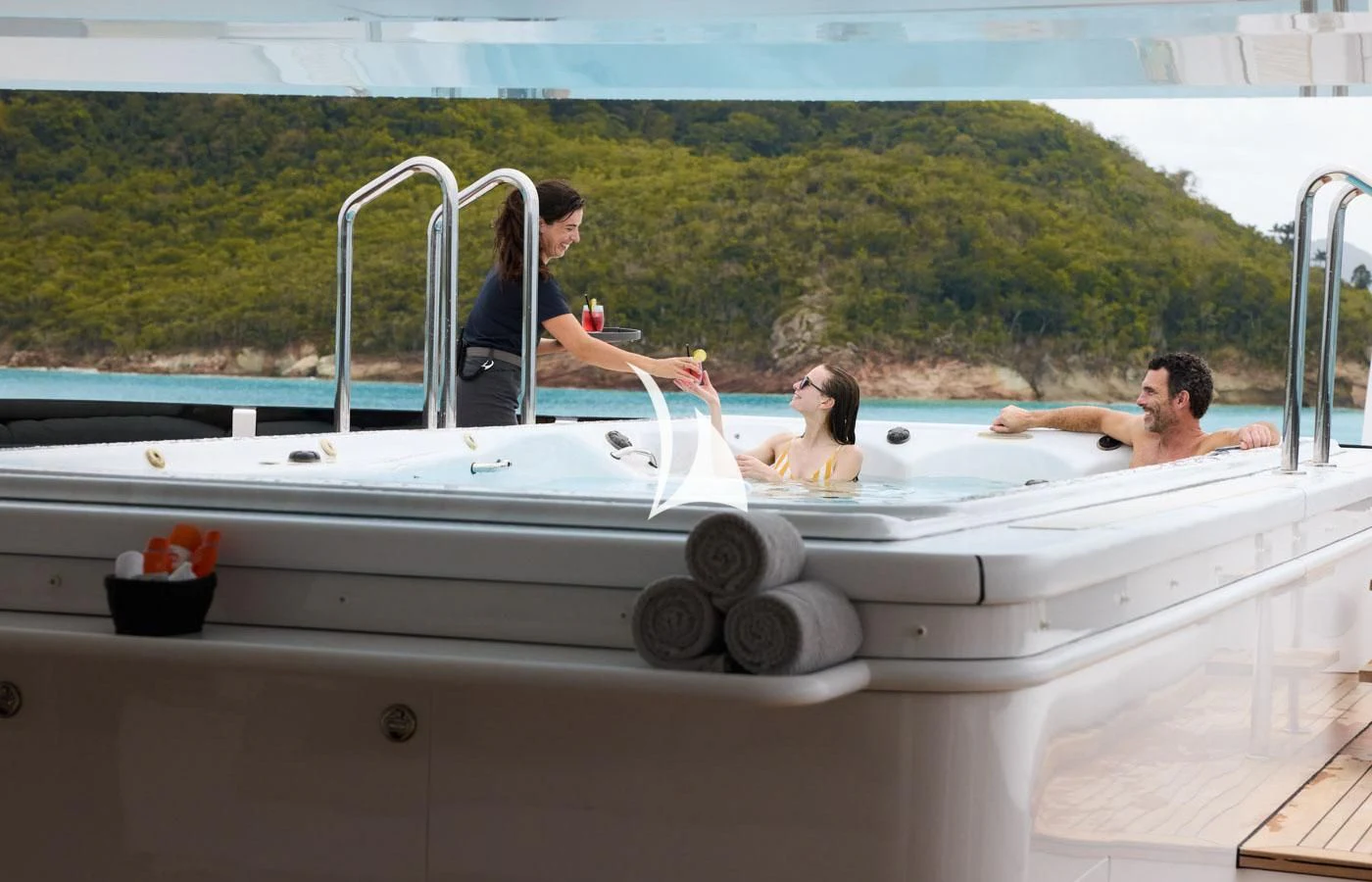 a group of people in a white boat aboard ARBEMA Yacht for Sale