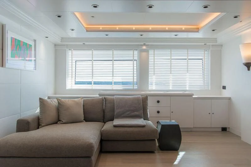 a living room with a couch and a chair aboard ARBEMA Yacht for Sale