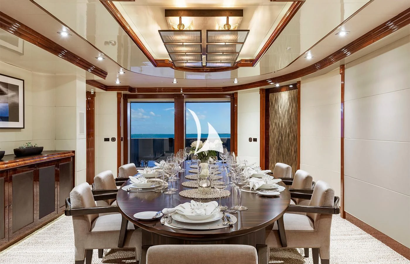 a dining room with a large table aboard ARBEMA Yacht for Sale