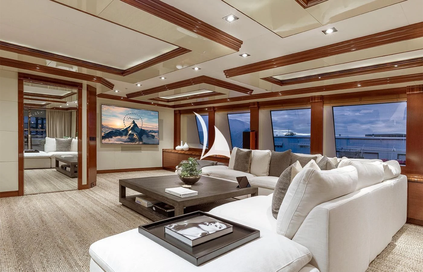 a living room with a large window aboard ARBEMA Yacht for Sale