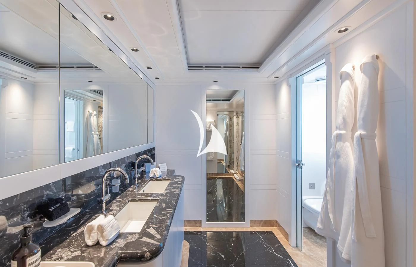 a bathroom with a large mirror aboard ARBEMA Yacht for Sale