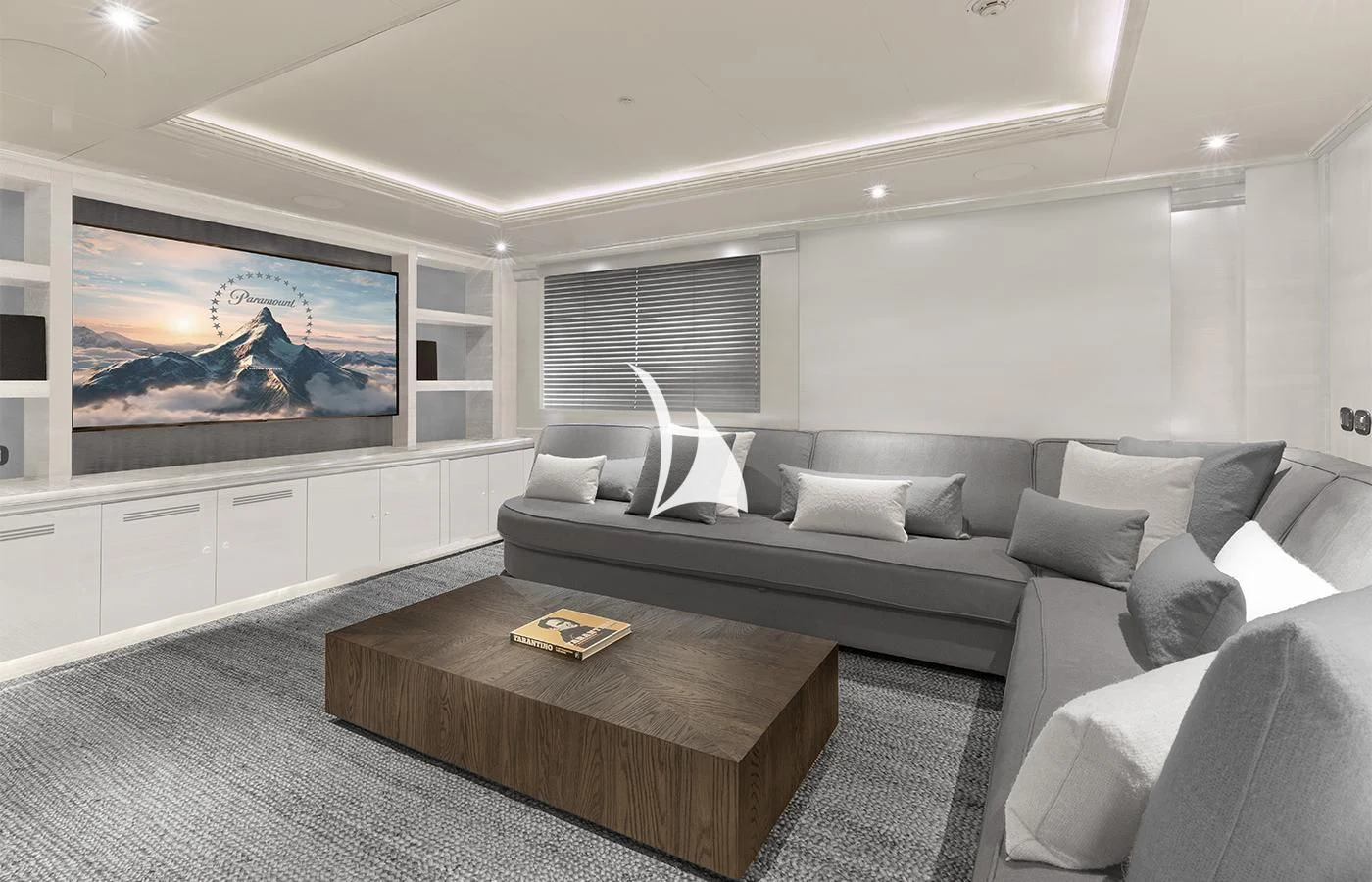 a living room with a large screen aboard ARBEMA Yacht for Sale
