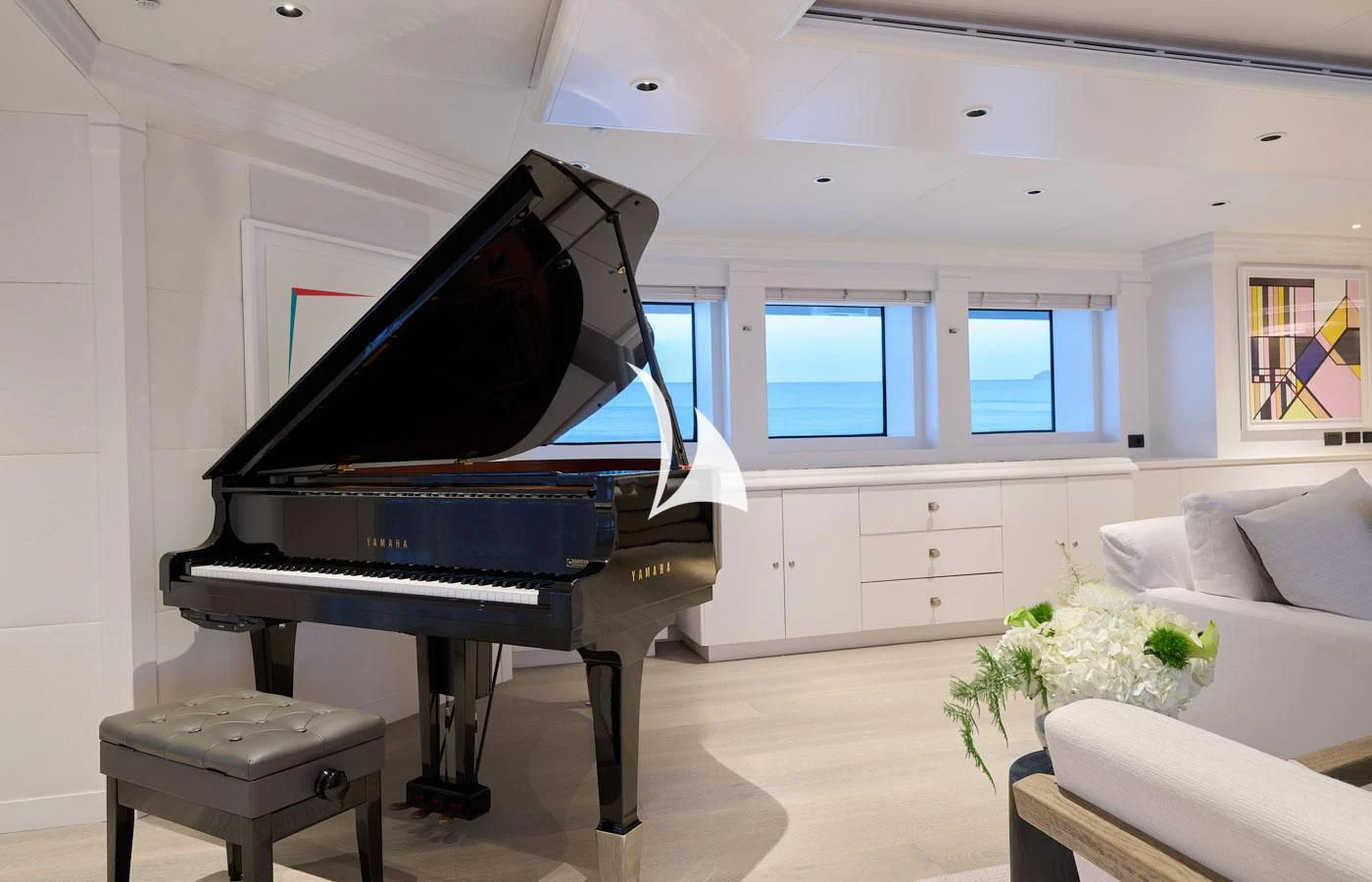 a piano in a room aboard ARBEMA Yacht for Sale
