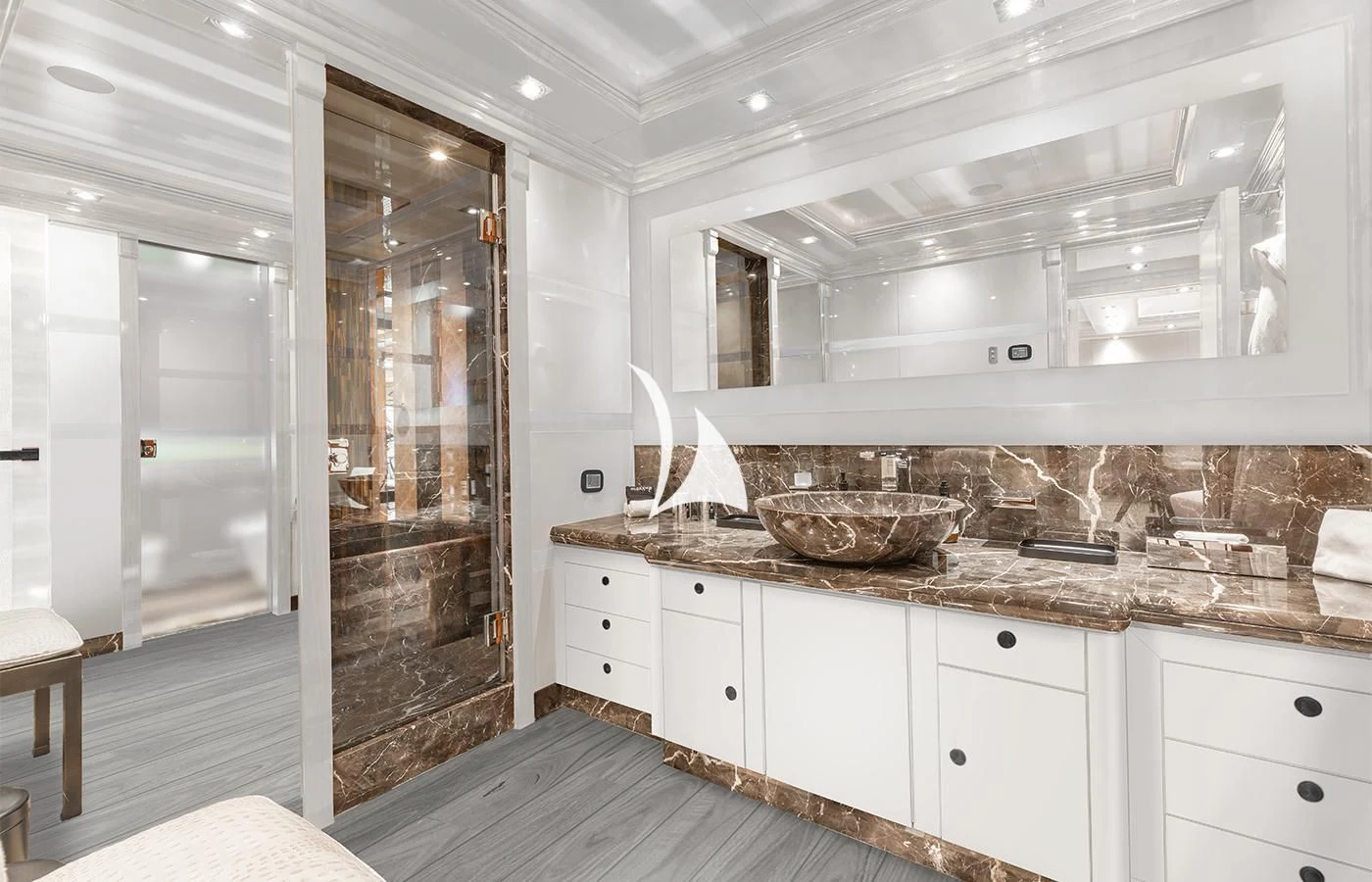 a bathroom with a sink and a mirror aboard ARBEMA Yacht for Sale
