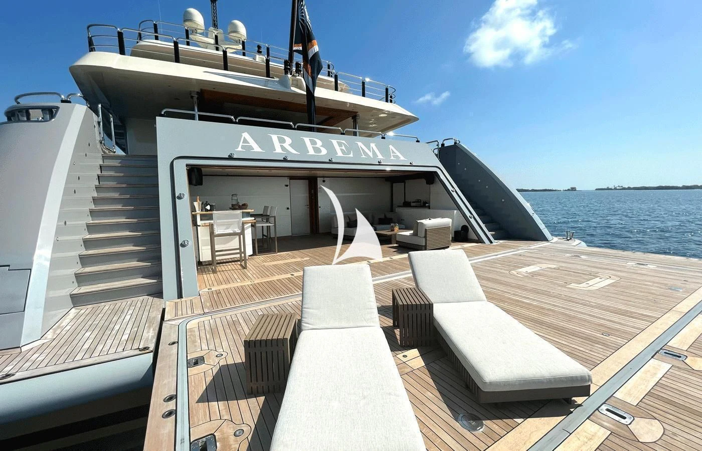 a deck with a boat on it aboard ARBEMA Yacht for Sale