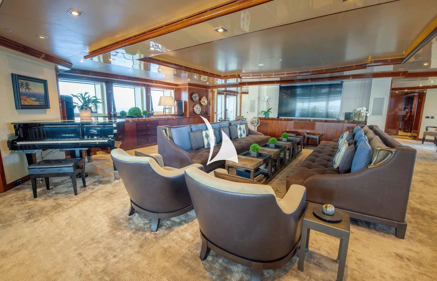 a living room with a couch and a table aboard ARBEMA Yacht for Sale