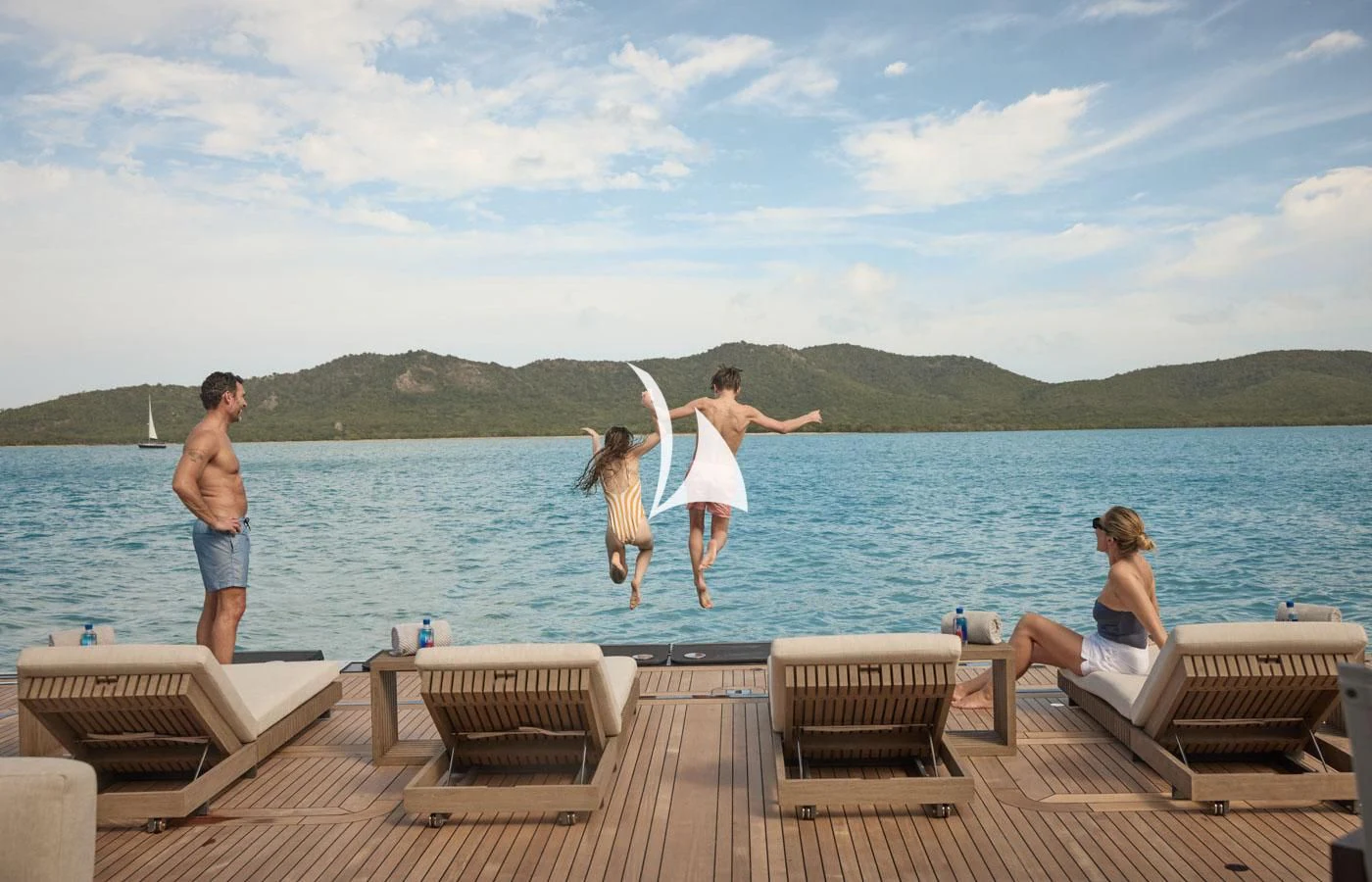 a group of people on a dock by a body of water aboard ARBEMA Yacht for Sale