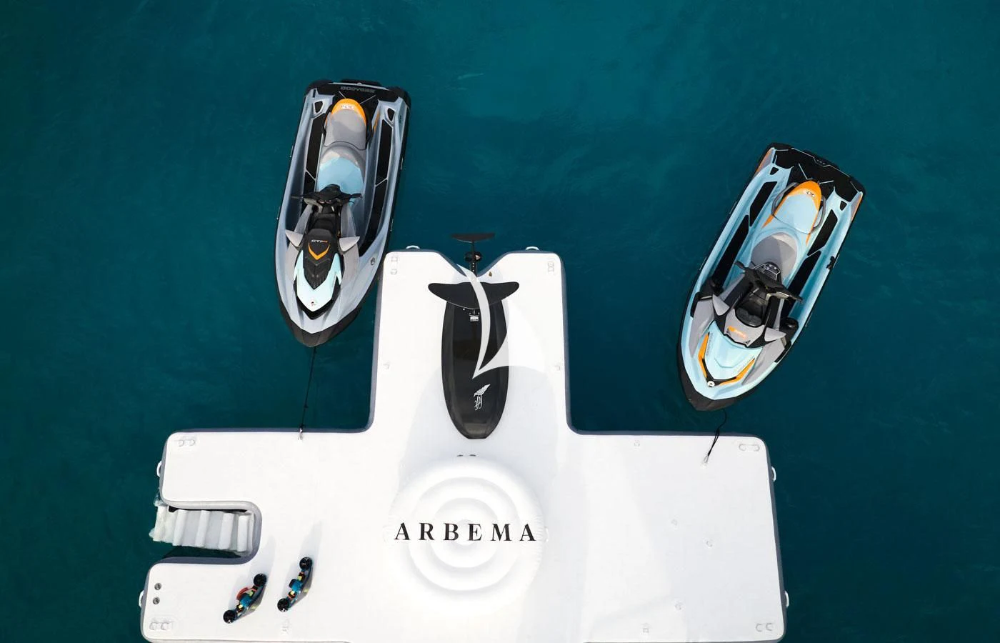 a white boat with a black and gold design on it aboard ARBEMA Yacht for Sale