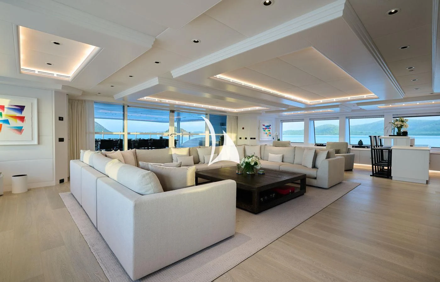 a large living room with a large window aboard ARBEMA Yacht for Sale