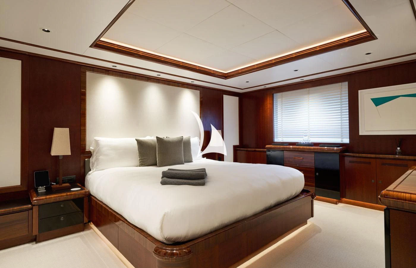 a large bedroom with a large bed aboard ARBEMA Yacht for Sale