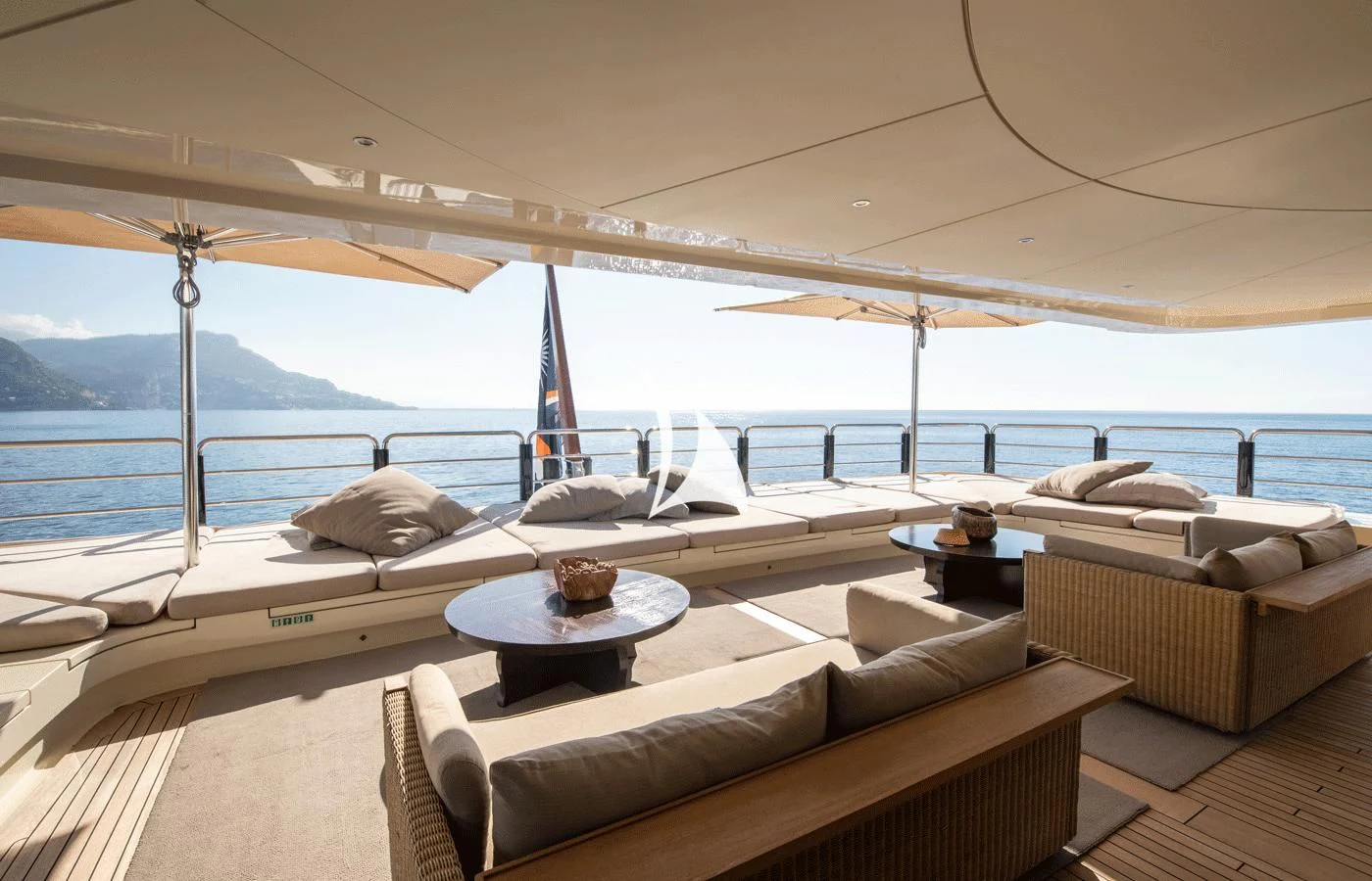 a lounge area with couches and a table on it aboard ARBEMA Yacht for Sale