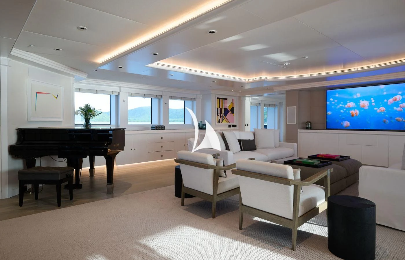 a living room with a piano and a piano aboard ARBEMA Yacht for Sale