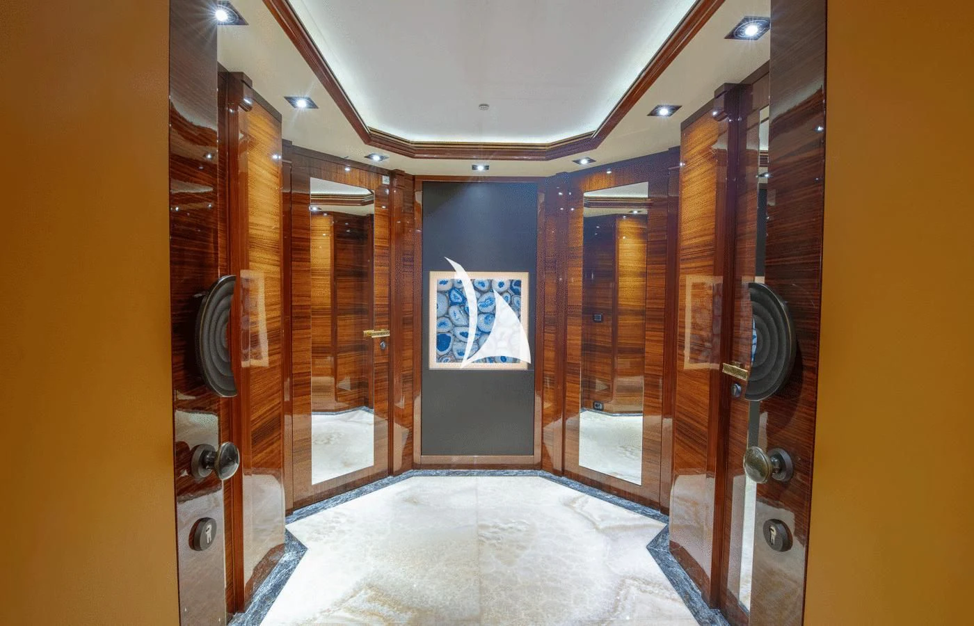 a bathroom with a large mirror aboard ARBEMA Yacht for Sale