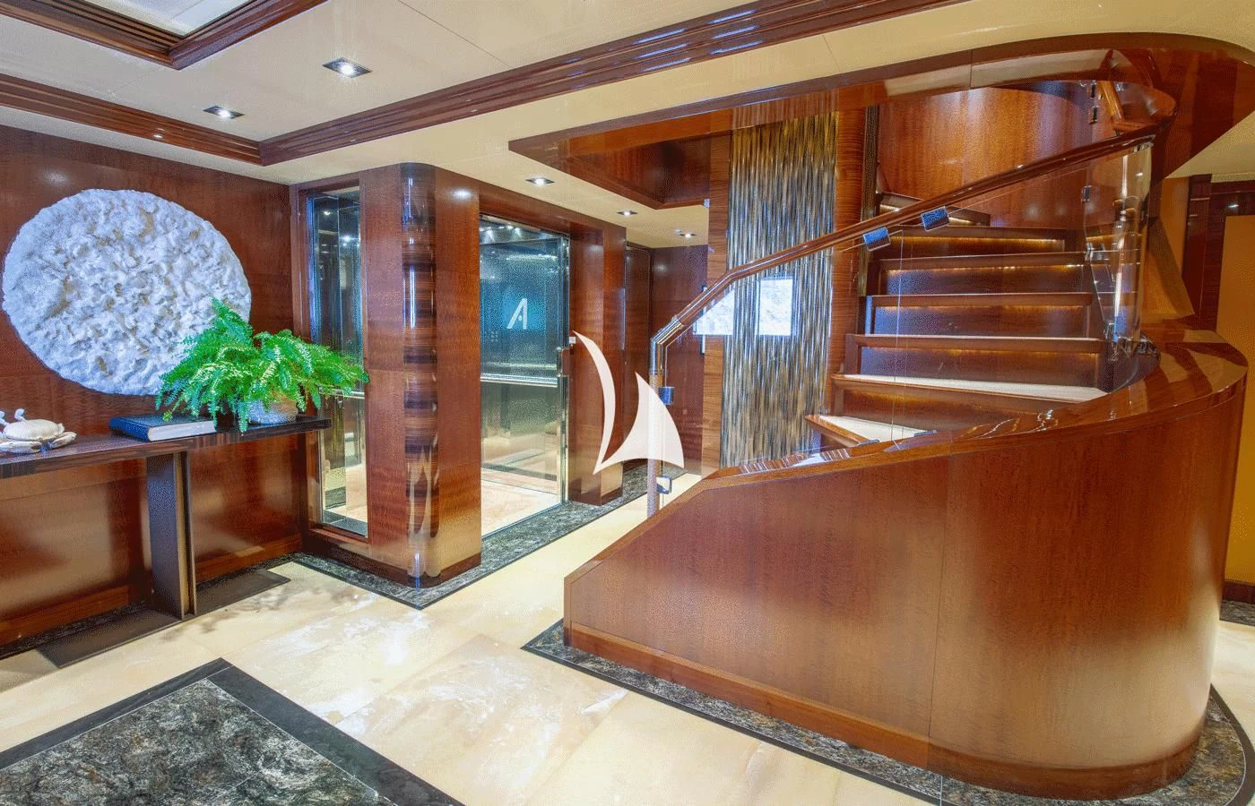 a room with a large wooden piano aboard ARBEMA Yacht for Sale