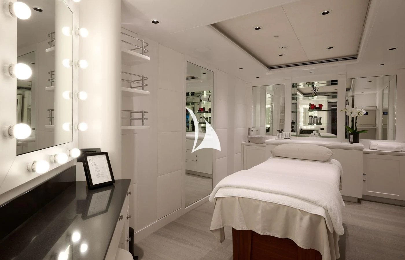 a bathroom with a large mirror aboard ARBEMA Yacht for Sale