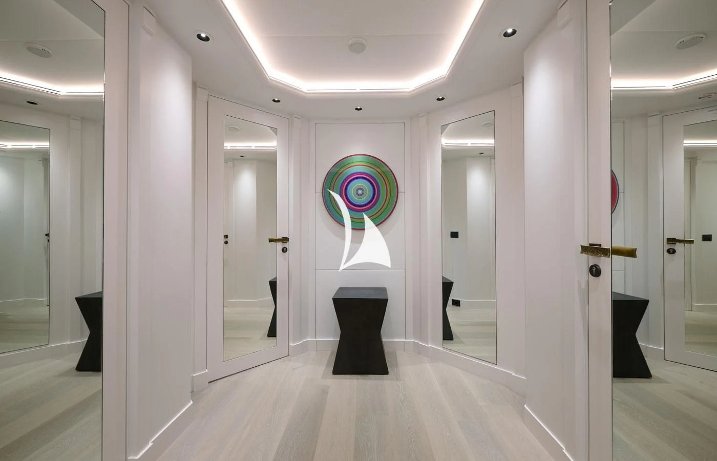 a hallway with doors and a mirror aboard ARBEMA Yacht for Sale