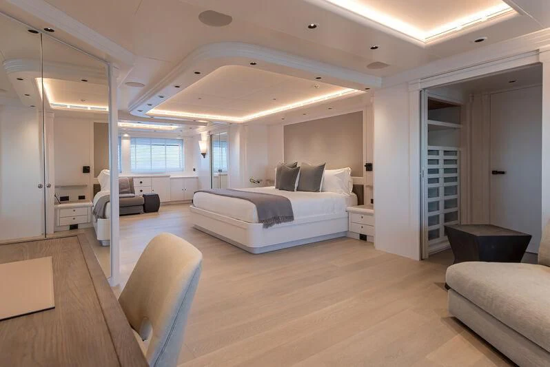 a large room with a bed and a couch aboard ARBEMA Yacht for Sale