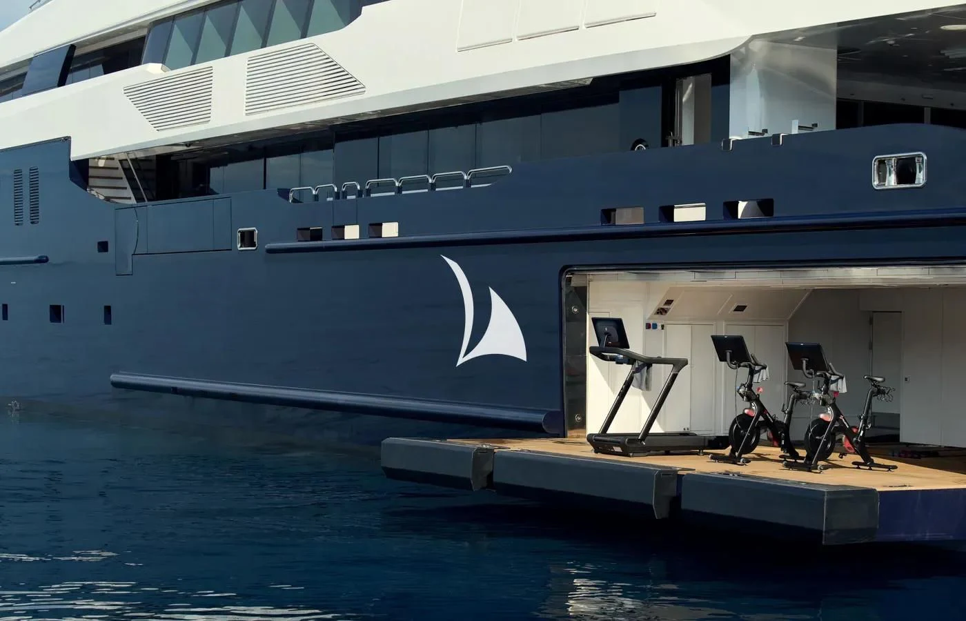 a large boat with a bicycle on it aboard ARBEMA Yacht for Sale