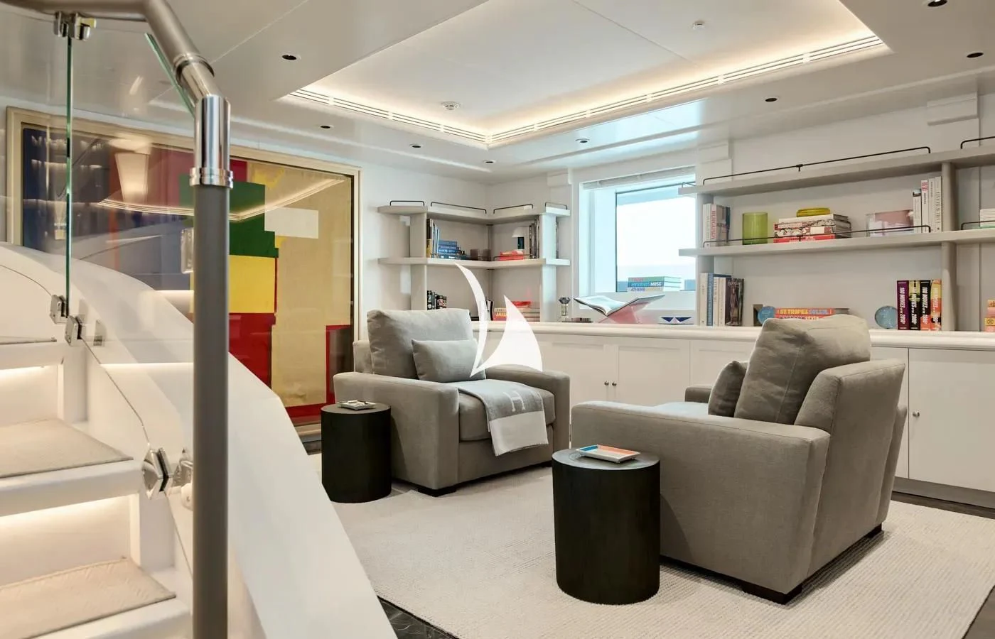 a living room with a couch and a coffee table aboard ARBEMA Yacht for Sale