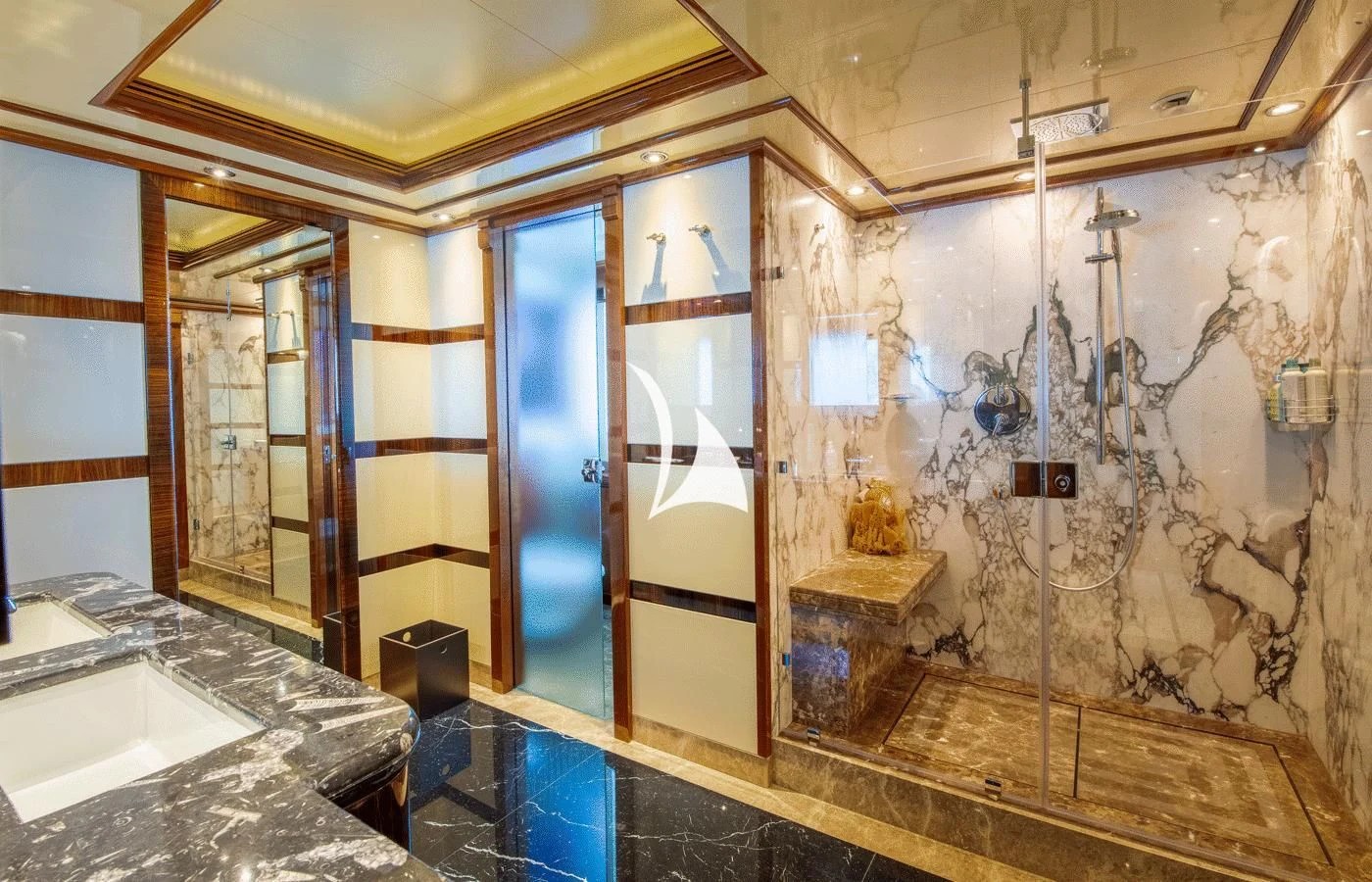 a bathroom with a large marble wall aboard ARBEMA Yacht for Sale