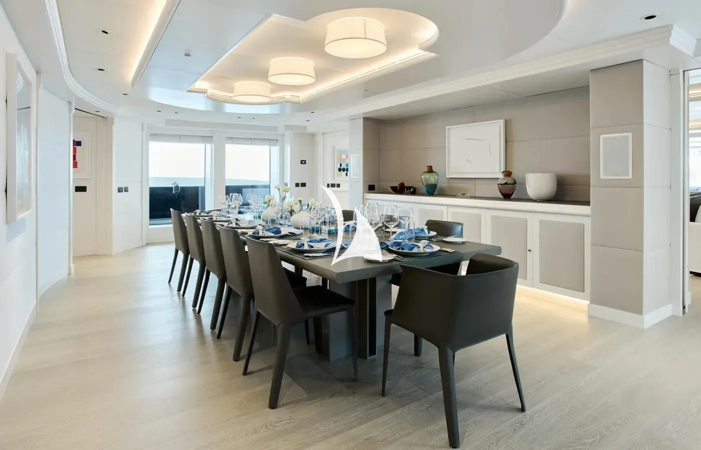 a large kitchen with a dining table aboard ARBEMA Yacht for Sale