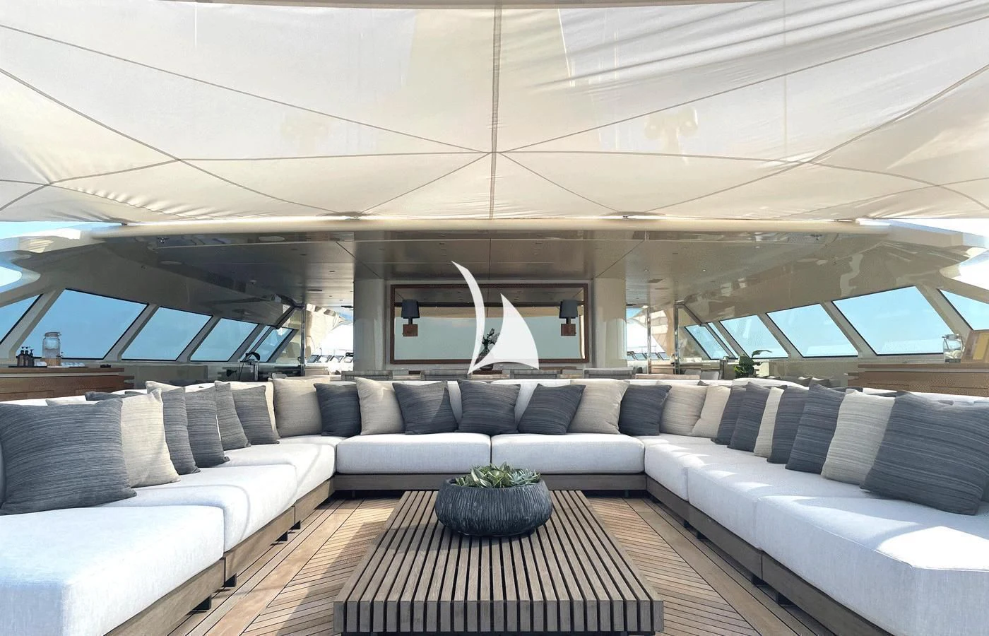 a living room with a couch and a table aboard ARBEMA Yacht for Sale
