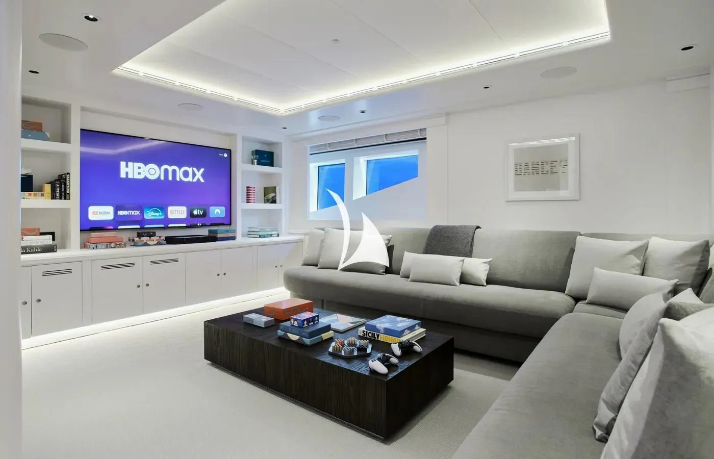 a living room with a tv and a couch aboard ARBEMA Yacht for Sale