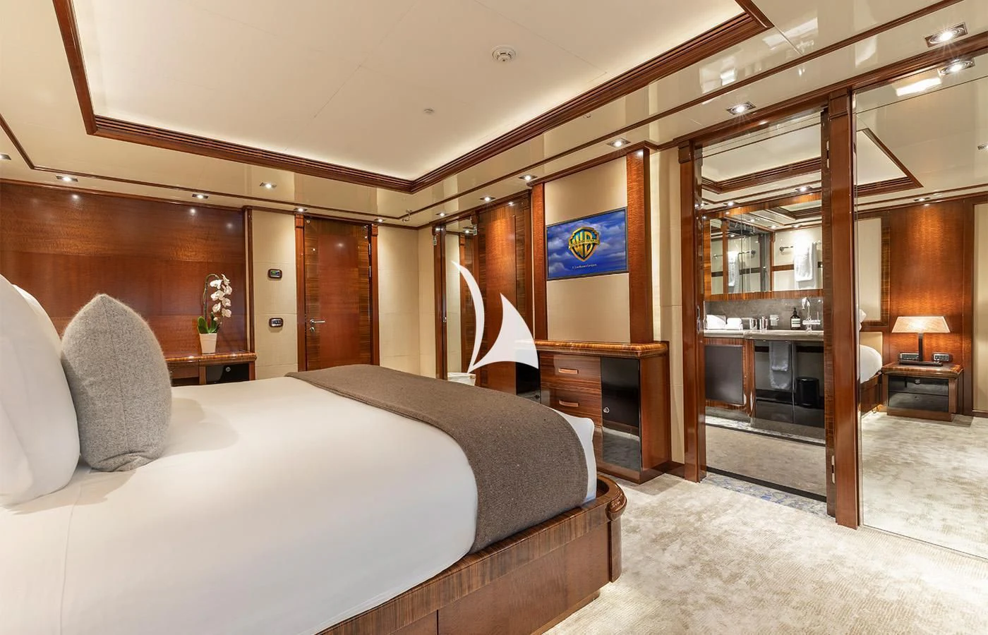 a bedroom with a bed and a closet aboard ARBEMA Yacht for Sale