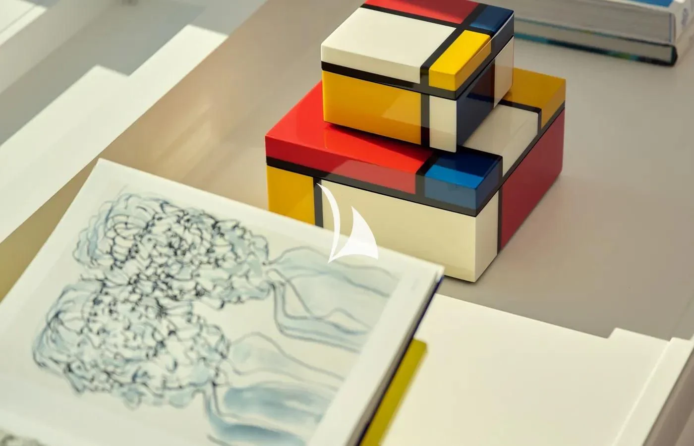 a group of books on a table aboard ARBEMA Yacht for Sale