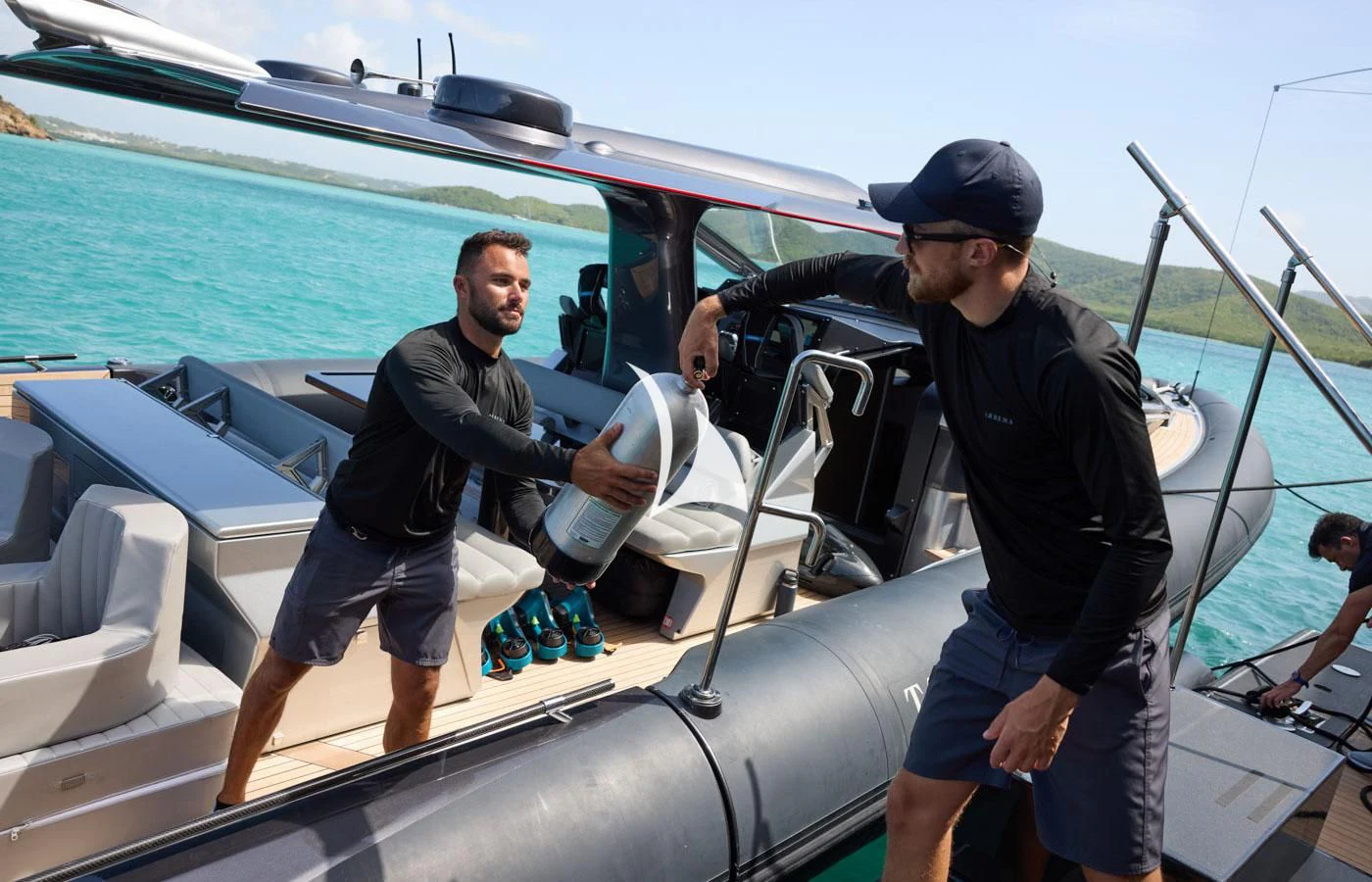 a couple of men on a boat aboard ARBEMA Yacht for Sale