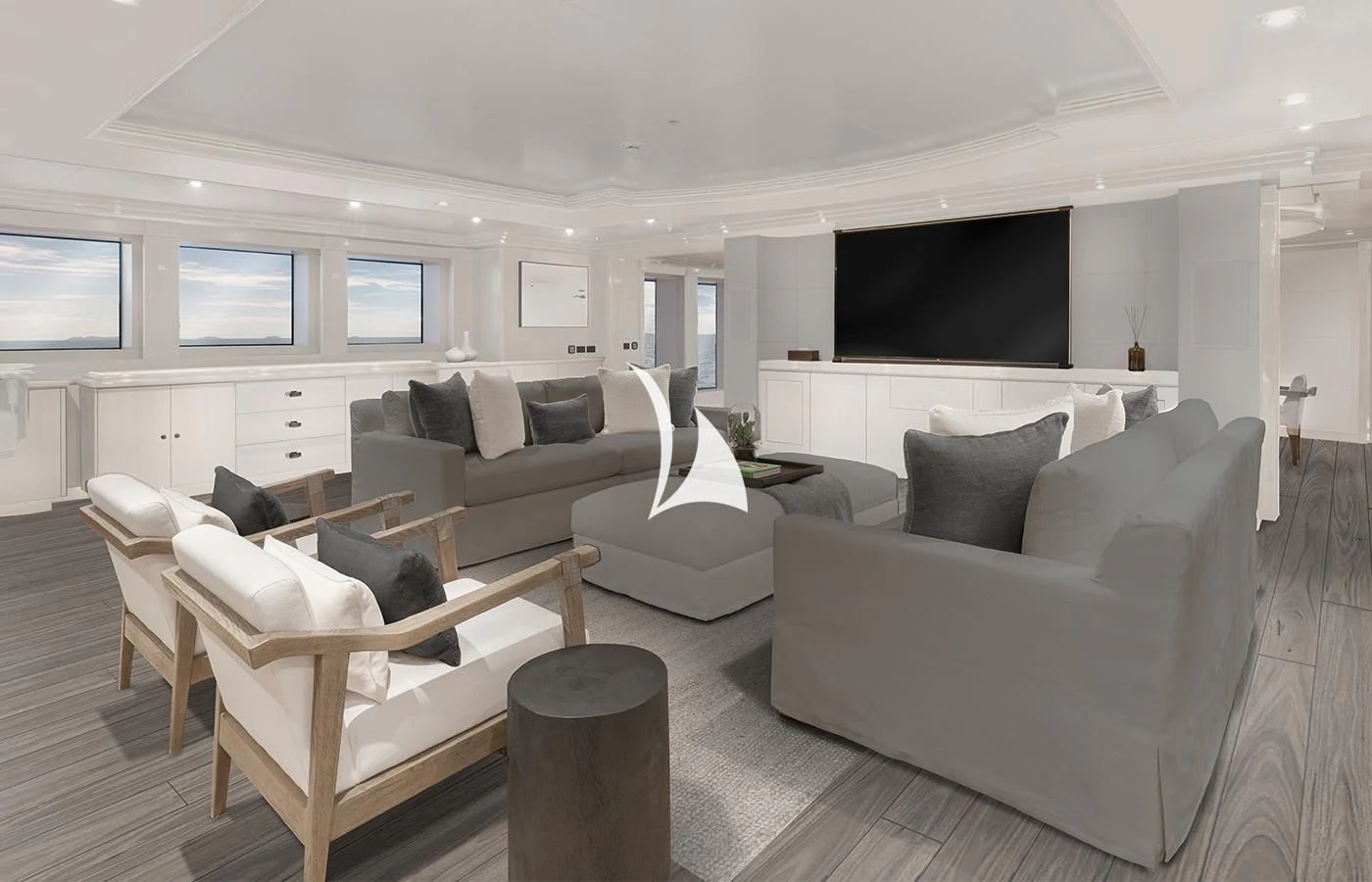 a living room with white furniture aboard ARBEMA Yacht for Sale