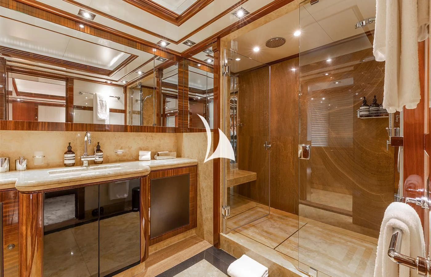 a bathroom with wooden cabinets aboard ARBEMA Yacht for Sale