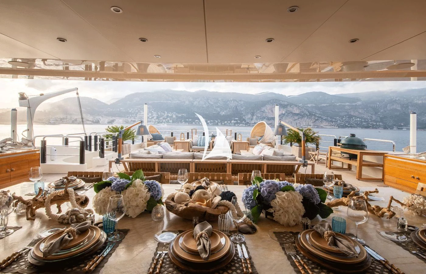 a room with a table and chairs aboard ARBEMA Yacht for Sale