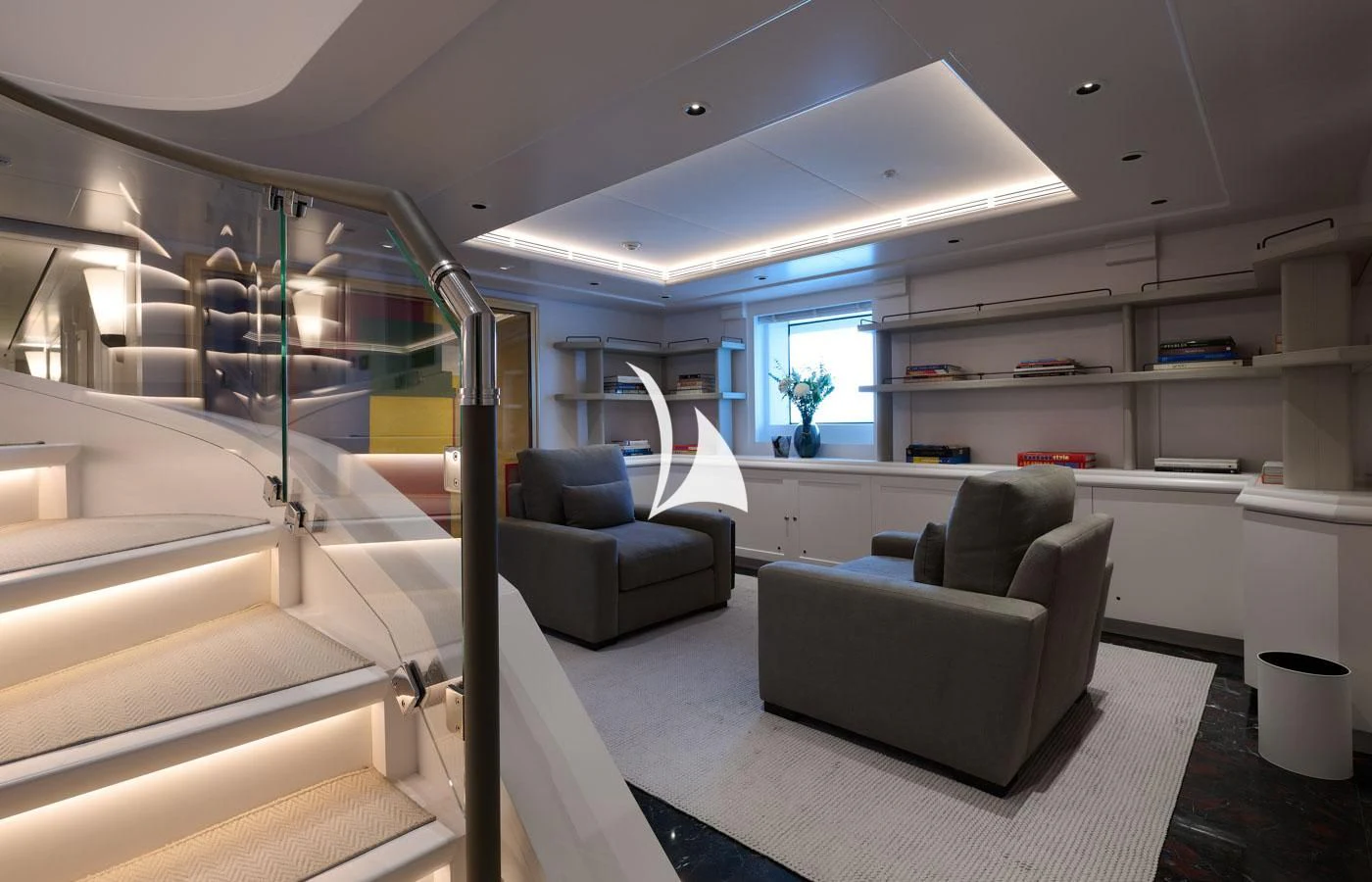 a room with a couch and a table aboard ARBEMA Yacht for Sale