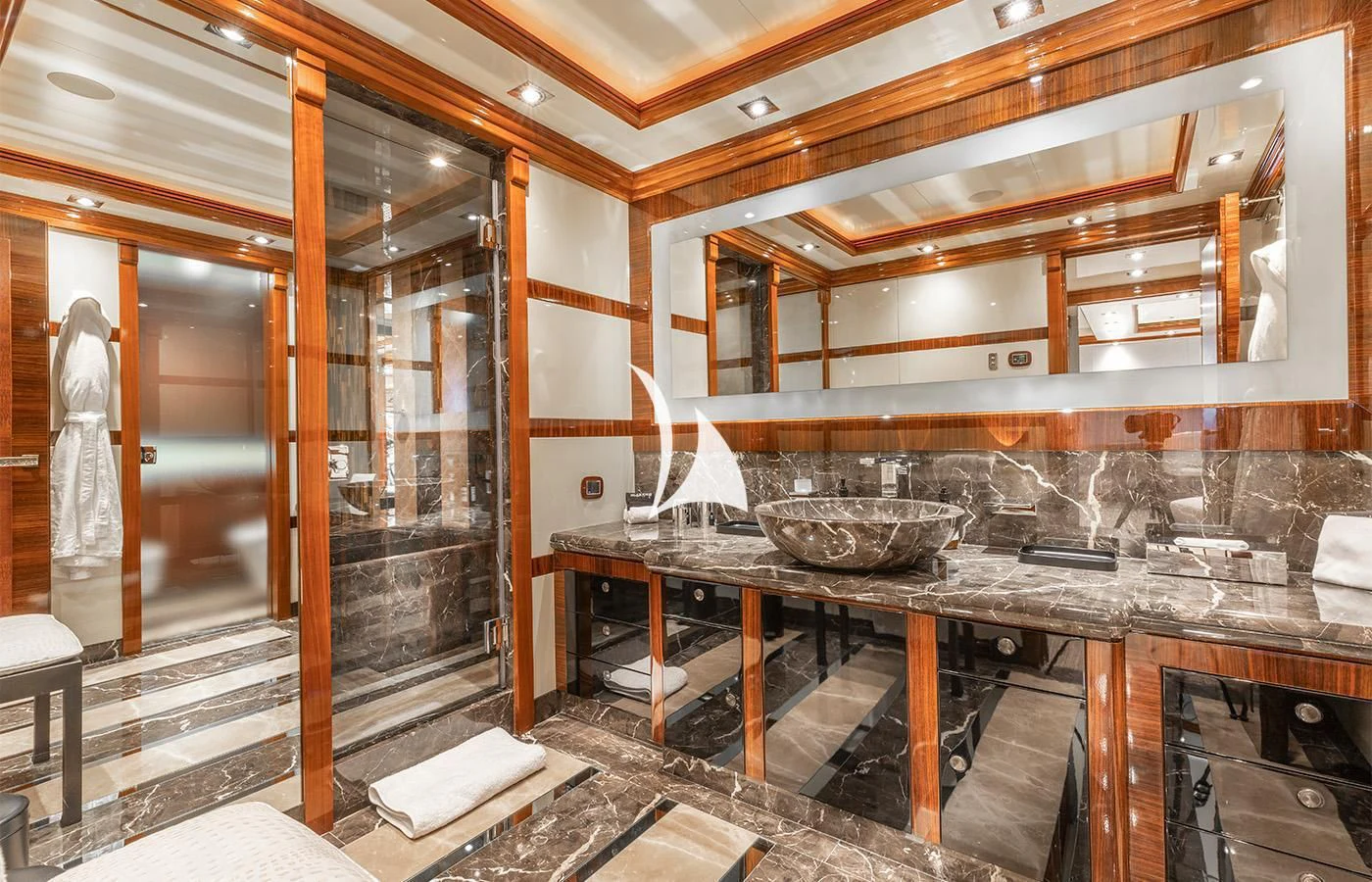 a kitchen with a sink and a large mirror aboard ARBEMA Yacht for Sale