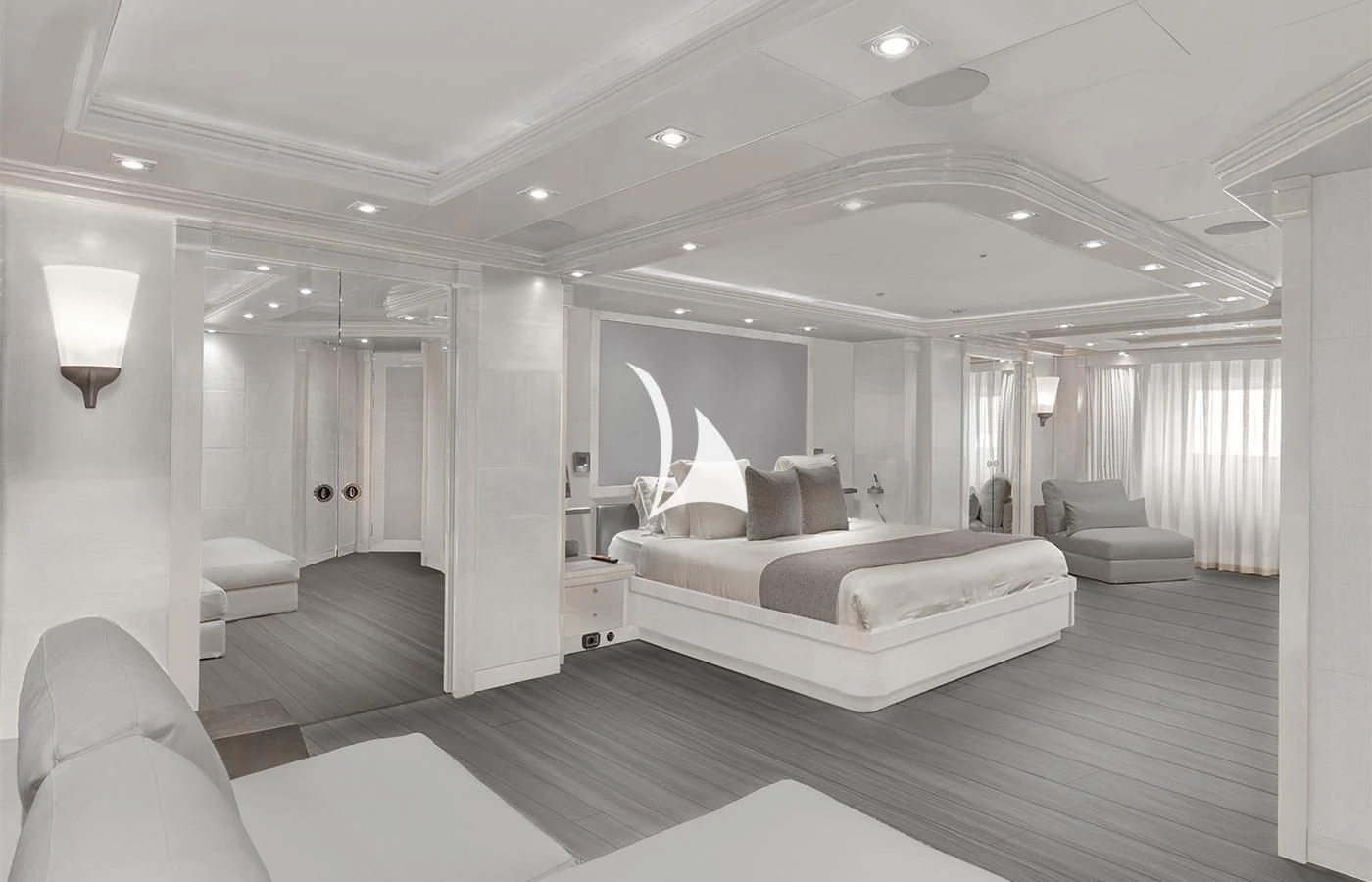 a large room with a bed and a couch aboard ARBEMA Yacht for Sale