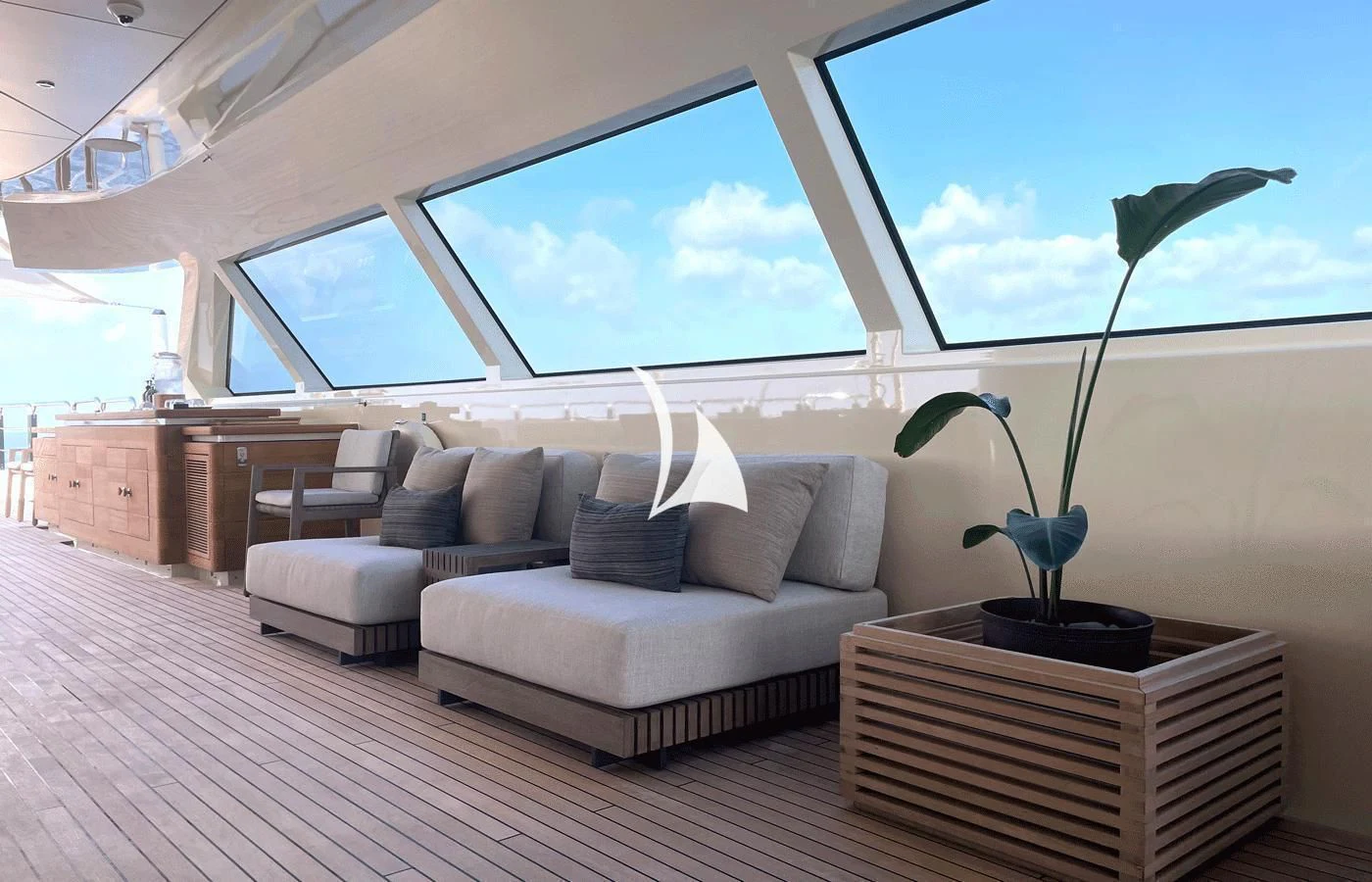 a living room with a large window aboard ARBEMA Yacht for Sale
