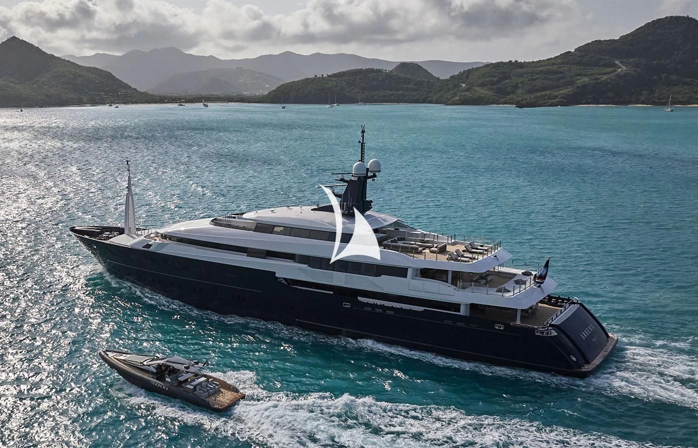 a boat and a small boat in the water aboard ARBEMA Yacht for Sale
