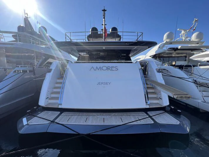 a group of boats in a harbor aboard AMORES Yacht for Sale
